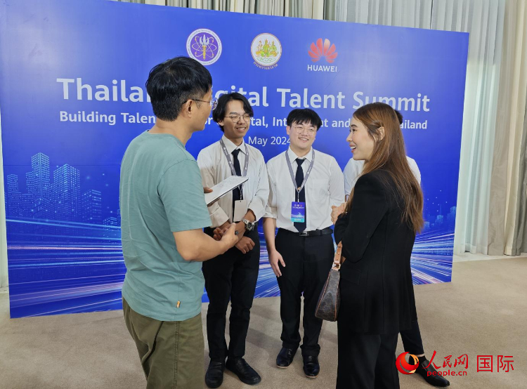 泰國國立法政大學(xué)學(xué)生接受本網(wǎng)采訪。李映民攝