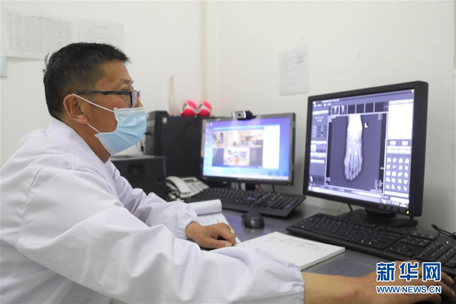 （圖文互動(dòng)）（3）隔屏看專(zhuān)家 “醫(yī)共體”緩解看病難