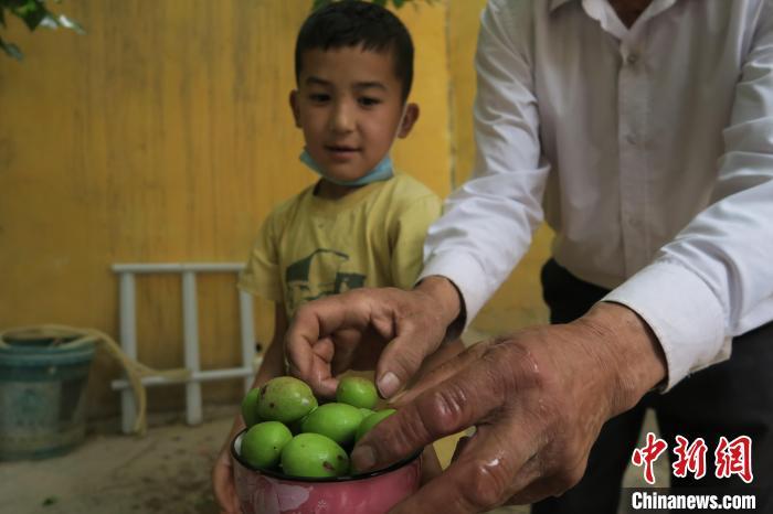 圖為進(jìn)藏先遣英雄連誓師地原址所在的新疆維吾爾自治區(qū)和田地區(qū)于田縣普魯村現(xiàn)貌?！畛坛?攝