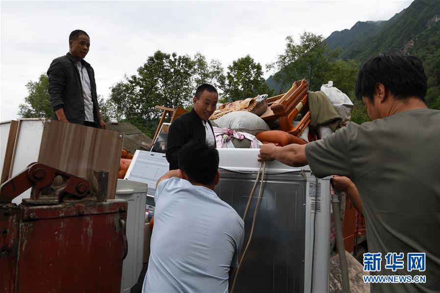 （新華全媒+）（9）千里“挪窩”，踏實(shí)開啟新生活