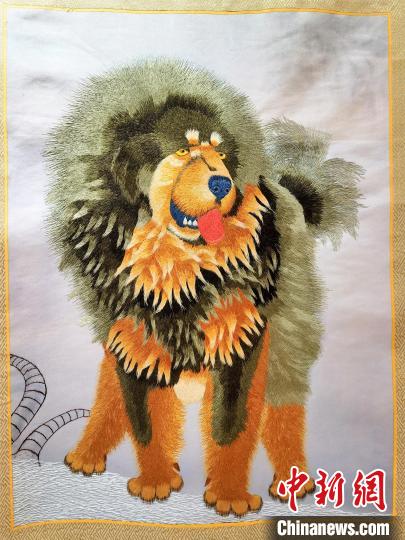 圖為藏繡作品?！∑钤鲚?攝